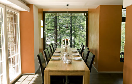 Large view of the dining area with its stunning picture windows