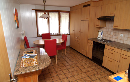 Larger view of the kitchen