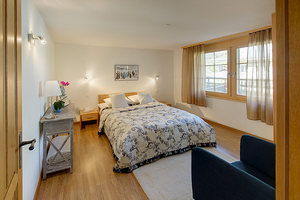 A second bedroom, with a 3 bed configuration